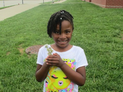 Elem Field Day Girl with Flowers